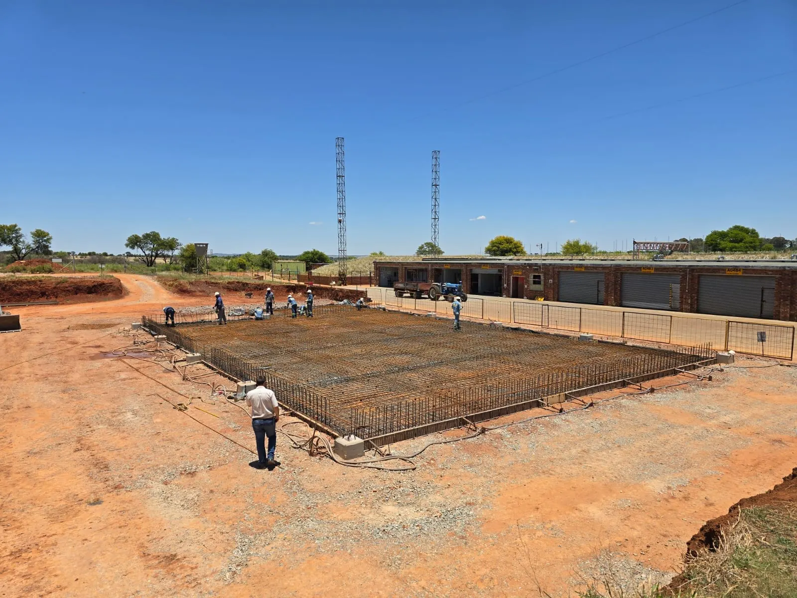 Reinforced foundation being prepared on site